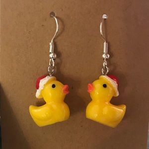New cute yellow ducky wearing a Santa hat earrings.